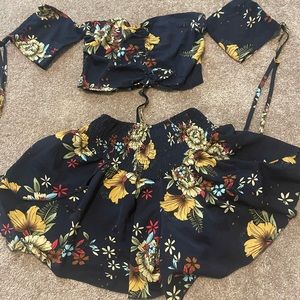 Two piece navy blue coordinate floral set with shorts.